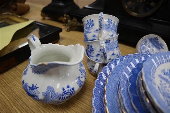 A blue and white Samuel Alcock china, plates, cups and saucers, soup tureen, ladle and dish